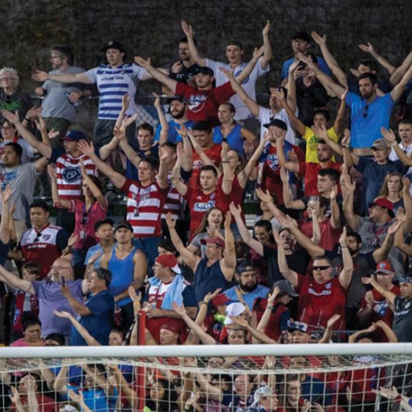 soccer fans behind the goal